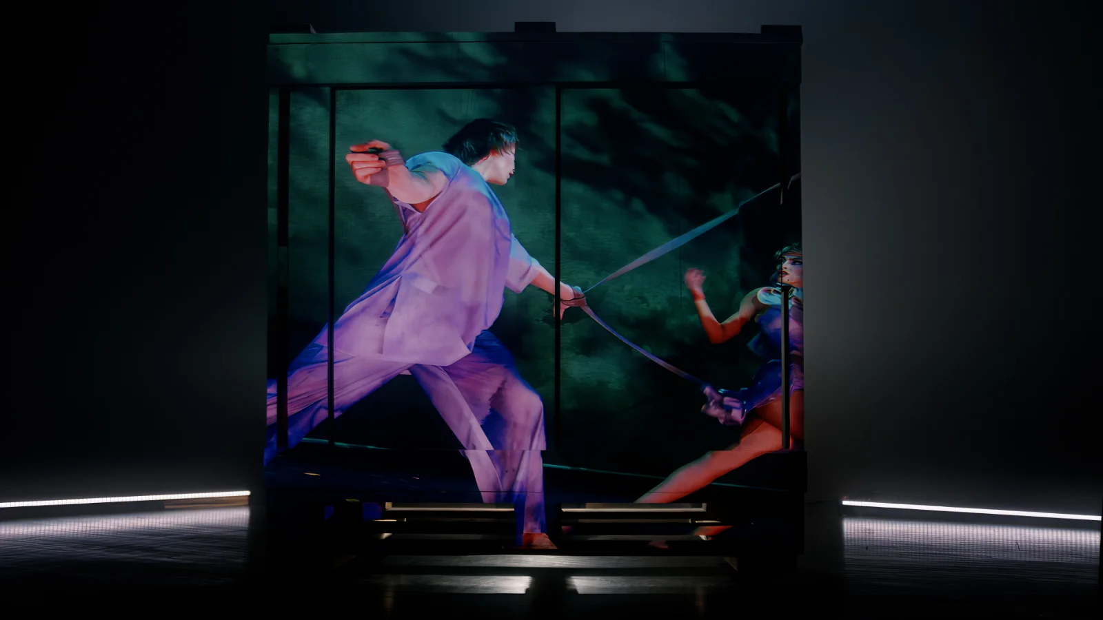 Cirque du Soleil performers projected on a large-scale surface using Epson technology